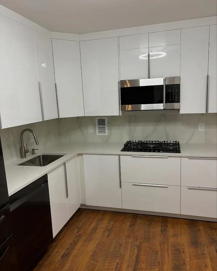 Restored kitchen with white cabinets after water damage in Edgewater